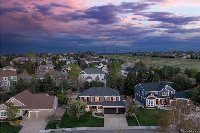 aerial view of property's location featuring nearby suburban area