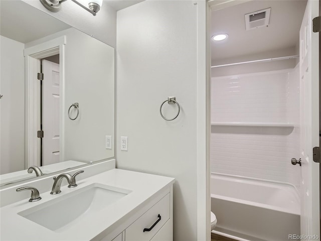 full bath with visible vents, vanity, toilet, bathing tub / shower combination, and recessed lighting
