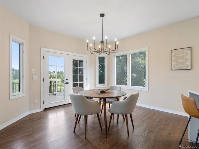 8425 Green Island Cir, Lone Tree, CO 80124 - dining space with a chandelier and dark wood-type flooring