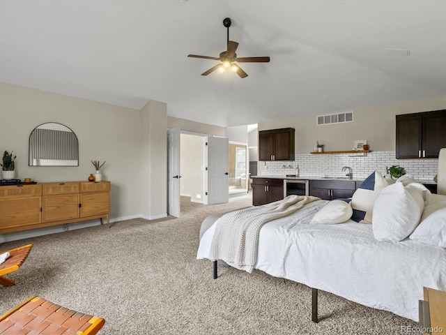8425 Green Island Cir, Lone Tree, CO 80124 - bedroom with light colored carpet, wine cooler, vaulted ceiling, and a ceiling fan