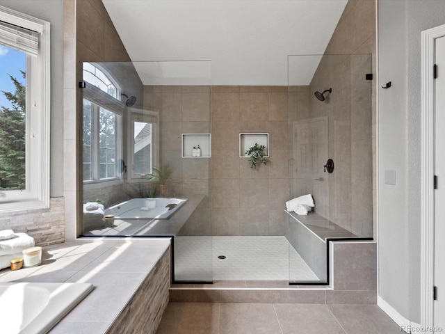 8425 Green Island Cir, Lone Tree, CO 80124 - full bath featuring tile patterned floors, a walk in shower, and a bath