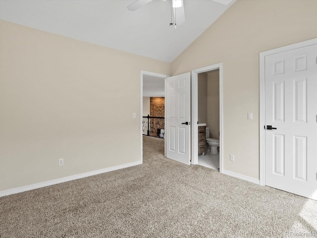 8425 Green Island Cir, Lone Tree, CO 80124 - unfurnished bedroom featuring carpet floors, connected bathroom, high vaulted ceiling, and a ceiling fan