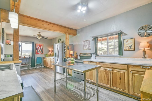 24857 US Highway 160, Walsenburg, CO 81089 - kitchen featuring stainless steel fridge with ice dispenser, beam ceiling, light wood-style flooring, light countertops, and ceiling fan