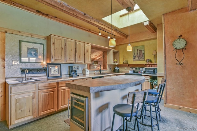 24857 US Highway 160, Walsenburg, CO 81089 - kitchen featuring light colored carpet, a kitchen island, a sink, beverage cooler, and a breakfast bar