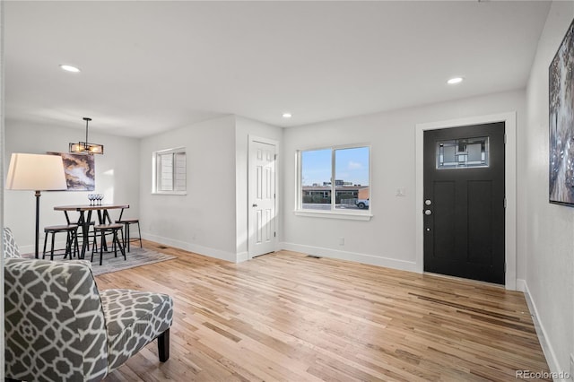 entrance foyer featuring light hardwood / wood-style floors