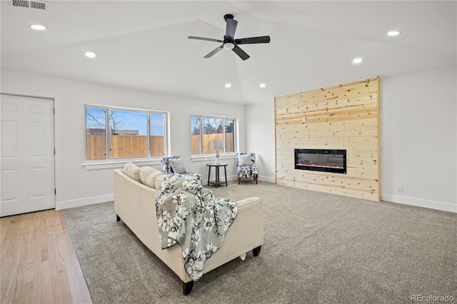 living room with vaulted ceiling and ceiling fan