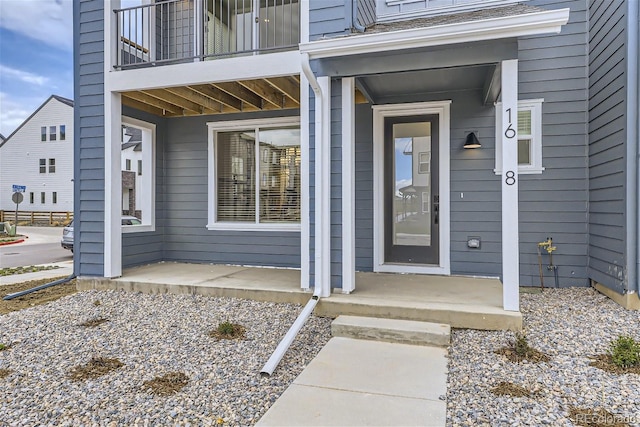 doorway to property with a balcony