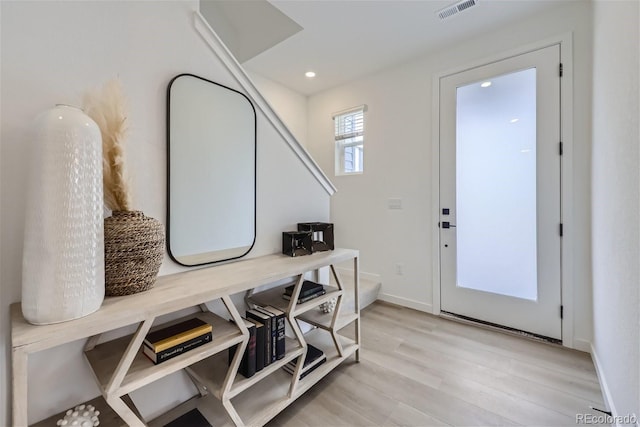 foyer entrance featuring light hardwood / wood-style floors