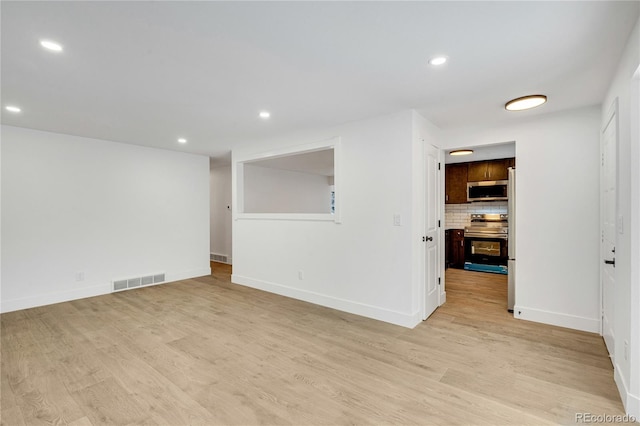 empty room featuring light wood-type flooring