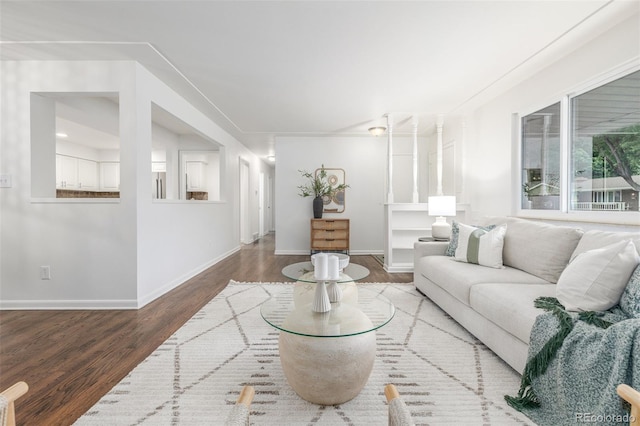 2644 S Krameria St, Denver, CO 80222 - living room featuring wood finished floors and baseboards