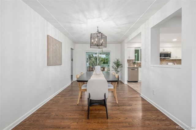 2644 S Krameria St, Denver, CO 80222 - dining area with a chandelier, baseboards, dark wood finished floors, and recessed lighting
