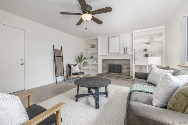 2644 S Krameria St, Denver, CO 80222 - living room with a ceiling fan, light carpet, and a fireplace
