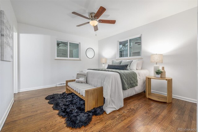2644 S Krameria St, Denver, CO 80222 - bedroom with wood finished floors, baseboards, and ceiling fan