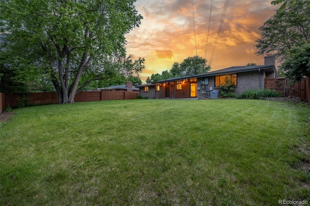 2644 S Krameria St, Denver, CO 80222 - yard at dusk with central air condition unit