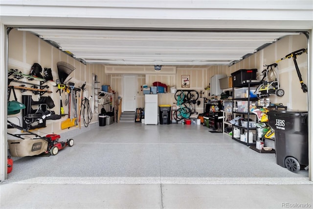1369 E Witherspoon Dr, Elizabeth, CO 80107 - garage with freestanding refrigerator