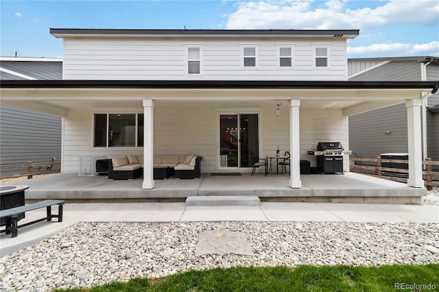 1369 E Witherspoon Dr, Elizabeth, CO 80107 - rear view of house featuring an outdoor living space and a patio
