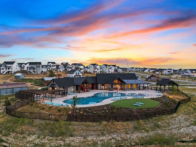 1369 E Witherspoon Dr, Elizabeth, CO 80107 - community pool featuring a residential view and a patio