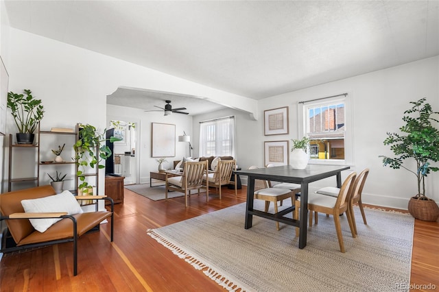 2269 S Bannock St, Denver, CO 80223 - dining space with baseboards, a ceiling fan, and wood finished floors