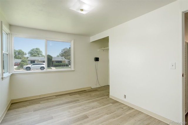 7291 Bryant St, Westminster, CO 80030 - unfurnished room featuring wood finished floors and baseboards