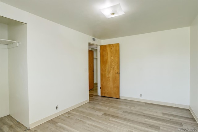 7291 Bryant St, Westminster, CO 80030 - unfurnished bedroom featuring light wood-style floors, baseboards, and a closet