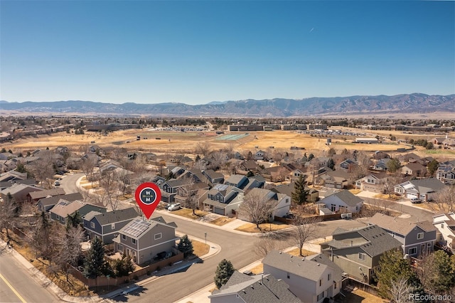 bird's eye view featuring a residential view and a mountain view