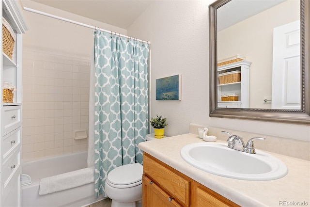 bathroom featuring toilet, shower / bath combination with curtain, and vanity