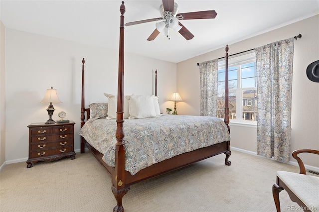 bedroom with carpet, ceiling fan, and baseboards