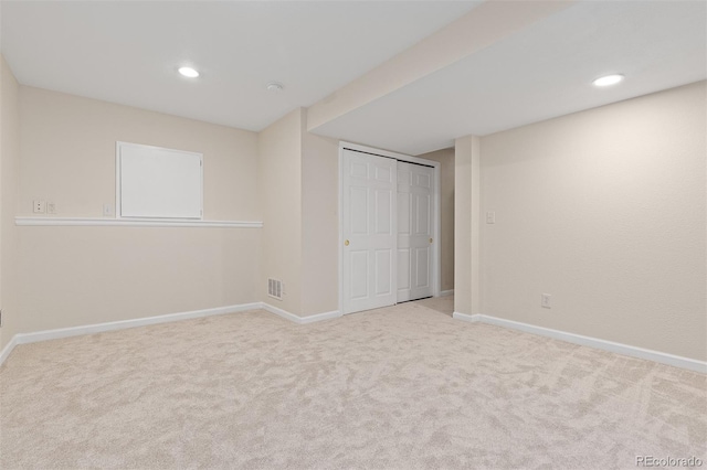 unfurnished bedroom with carpet floors, baseboards, visible vents, and recessed lighting