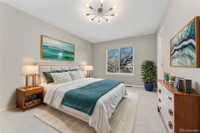 carpeted bedroom featuring a notable chandelier