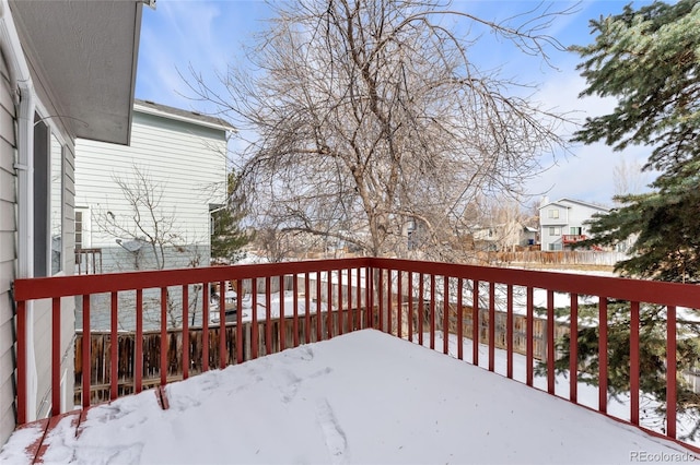 view of snow covered deck