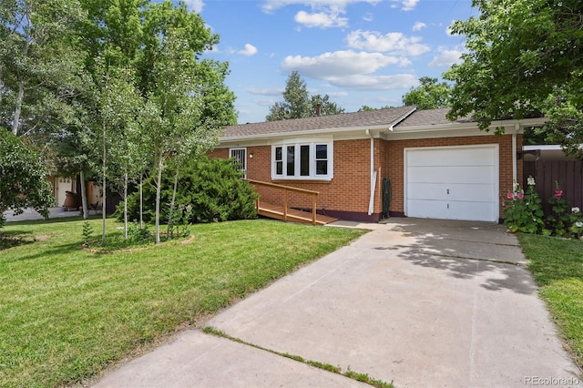 940 Nile St, Golden, CO 80401 - ranch-style house featuring a garage, brick siding, a front yard, concrete driveway, and roof with shingles
