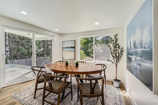 1183 S Pierson Ct, Denver, CO 80232 - dining space featuring light wood-style flooring and recessed lighting