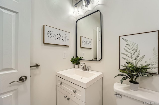 1183 S Pierson Ct, Denver, CO 80232 - bathroom featuring vanity and toilet