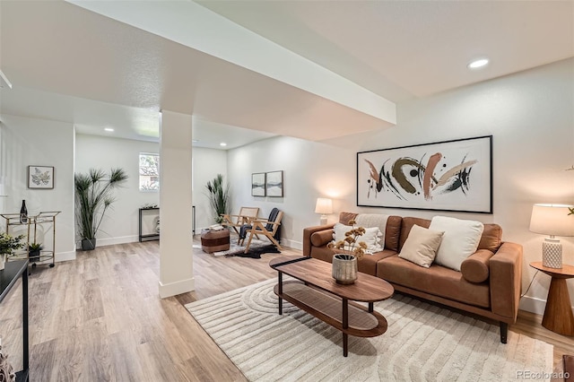 1183 S Pierson Ct, Denver, CO 80232 - living area featuring light wood-type flooring, baseboards, and recessed lighting