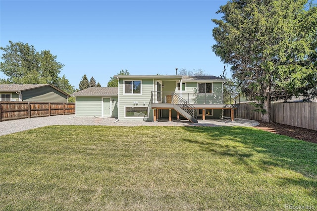 1183 S Pierson Ct, Denver, CO 80232 - back of property featuring stairs and a wooden deck