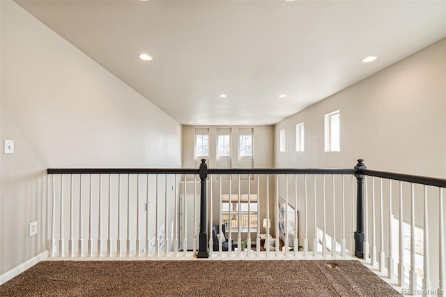 hall with recessed lighting and carpet floors