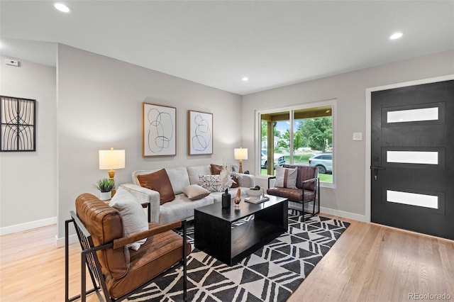 1310 E Amherst Ave, Englewood, CO 80113 - living room featuring light wood-type flooring and recessed lighting