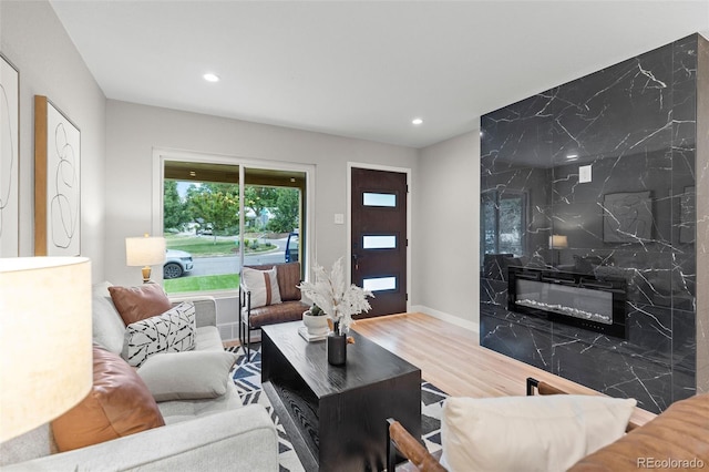 1310 E Amherst Ave, Englewood, CO 80113 - living room with wood finished floors, recessed lighting, and a premium fireplace