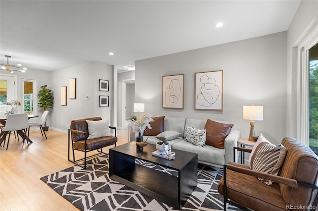1310 E Amherst Ave, Englewood, CO 80113 - living area with light wood-type flooring and recessed lighting