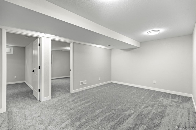 1310 E Amherst Ave, Englewood, CO 80113 - finished basement featuring carpet floors and a textured ceiling