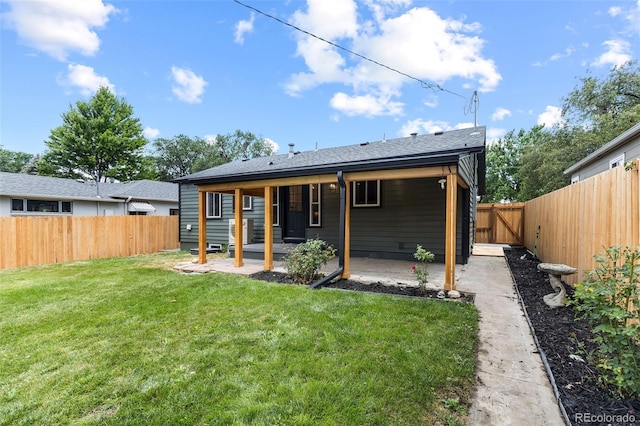 1310 E Amherst Ave, Englewood, CO 80113 - back of house with a patio area and a fenced backyard