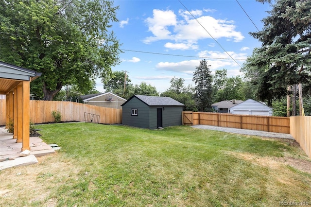 1310 E Amherst Ave, Englewood, CO 80113 - fenced backyard featuring an outbuilding