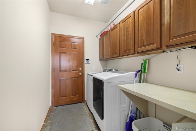 10044 E 146th Pl, Brighton, CO 80602 - laundry area with baseboards, cabinet space, washer and dryer, and visible vents