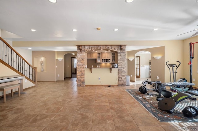 10044 E 146th Pl, Brighton, CO 80602 - workout area with arched walkways, a ceiling fan, recessed lighting, and baseboards