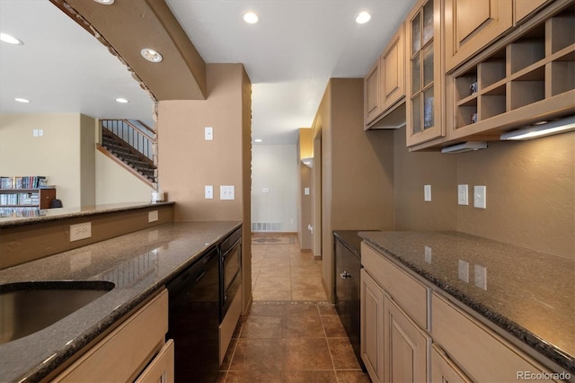 10044 E 146th Pl, Brighton, CO 80602 - kitchen featuring black dishwasher, recessed lighting, dark stone counters, visible vents, and glass insert cabinets