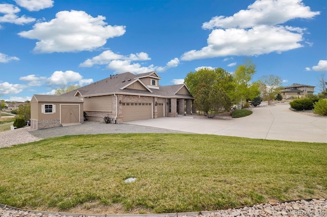 10044 E 146th Pl, Brighton, CO 80602 - view of front of home with a garage, brick siding, a front lawn, concrete driveway, and a storage unit