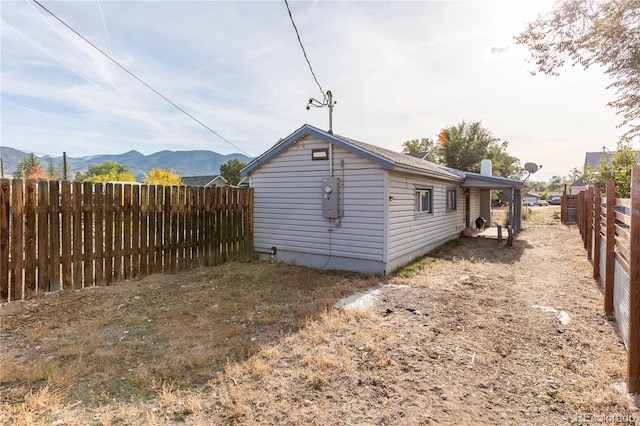 view of home's exterior featuring a mountain view