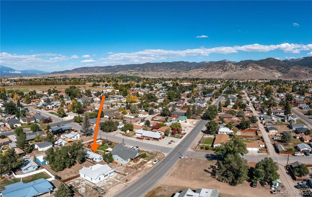 drone / aerial view featuring a mountain view