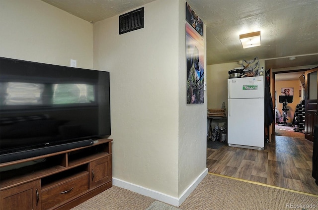 1320 H St, Salida, CO 81201 - living room featuring baseboards