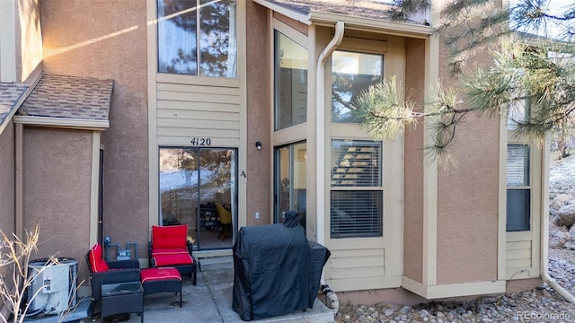 back of property featuring a patio area